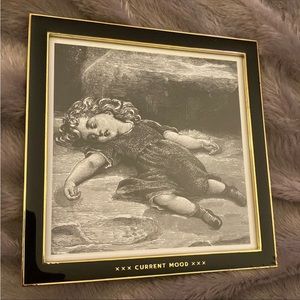 “Current Mood” easy tiger, 5x5 black and gold picture frame.